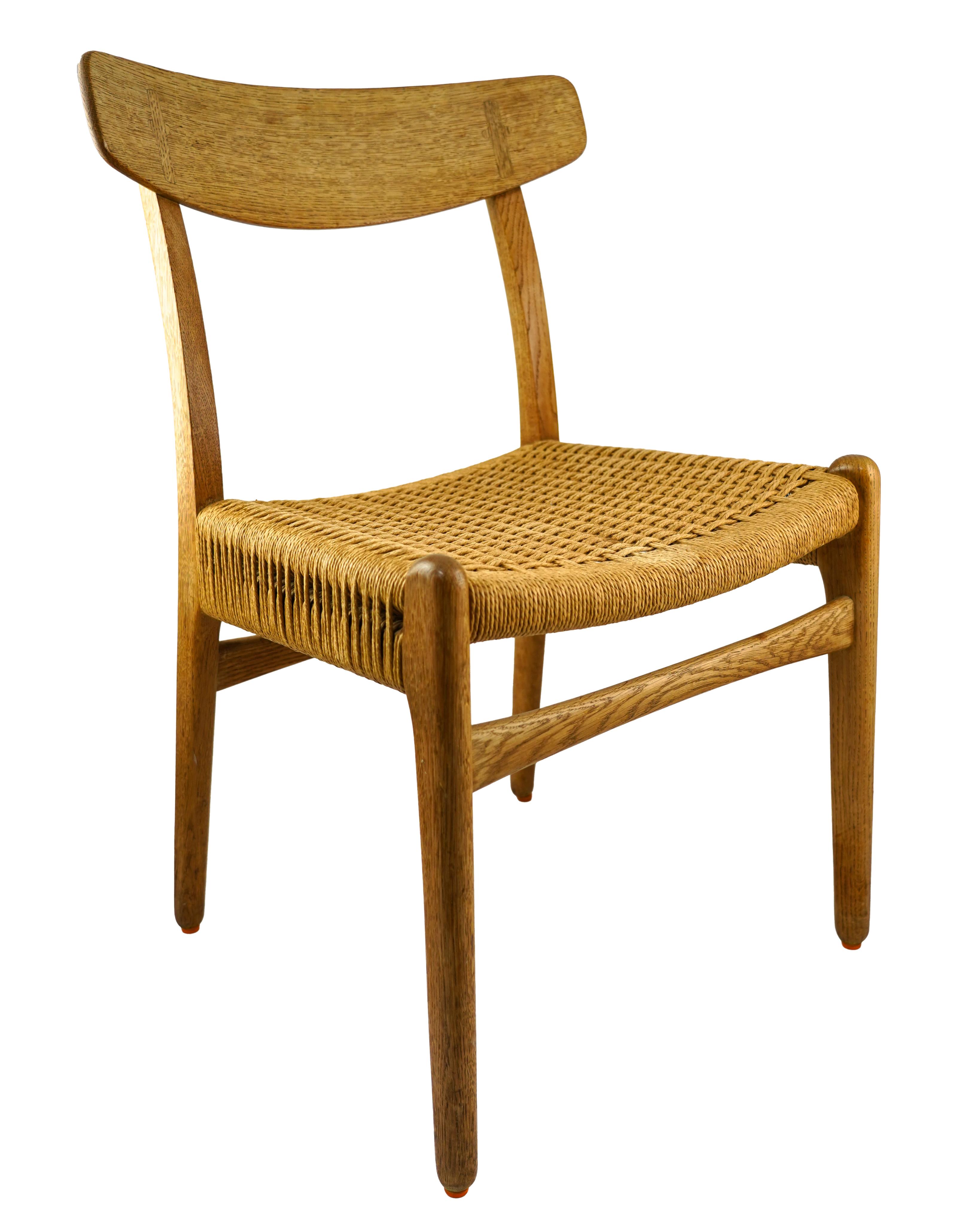 Hans Jørgensen Wegner (Danish, 1914-2007) for Carl Hansen & Søn Møbelfabrik : Two oak 'CH23' dining chairs